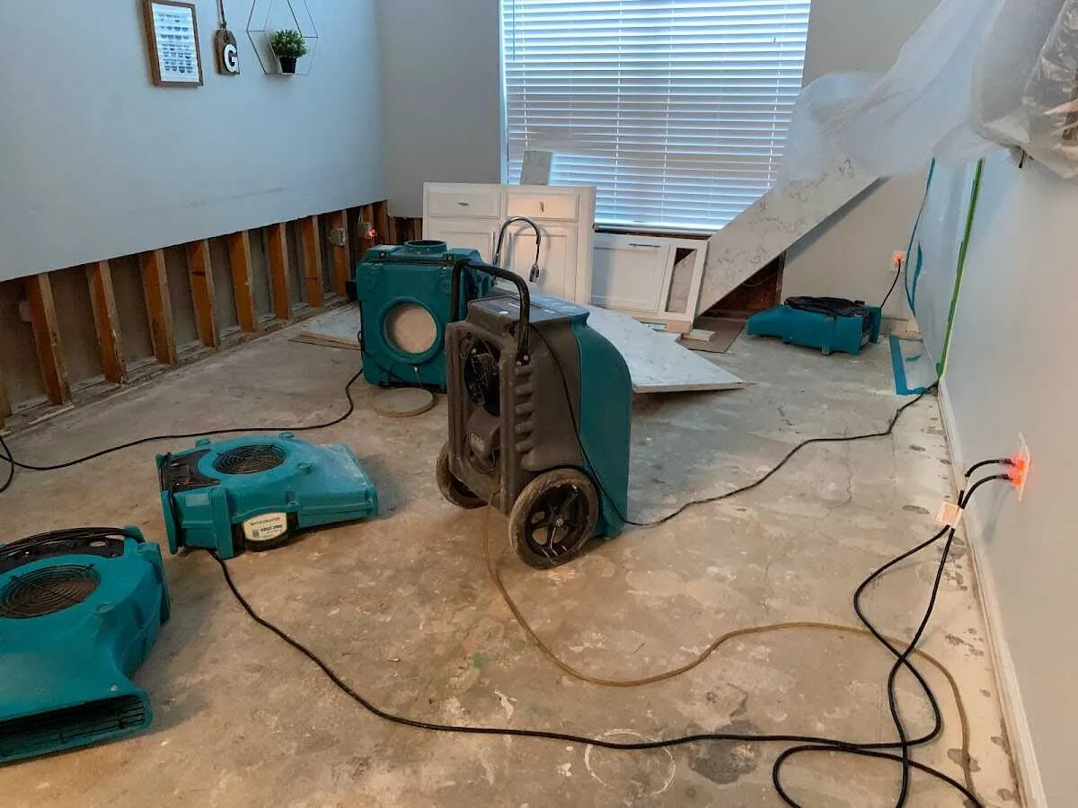 Dehumidifier in flood-cut room for Water Damage Restoration in Fishersville